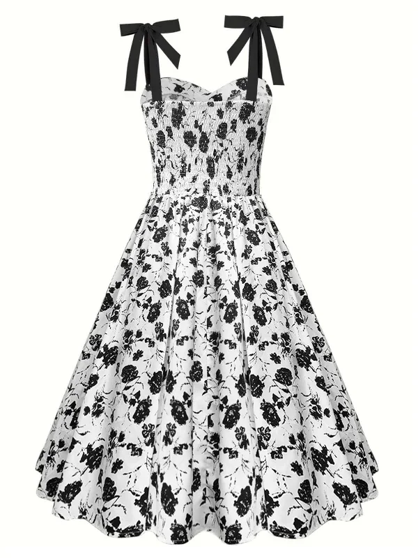 white-1950s-black-flowers-tie-up-dress